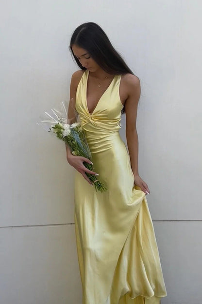 Robe de soirée sirène longue jaune dos nu avec col halter