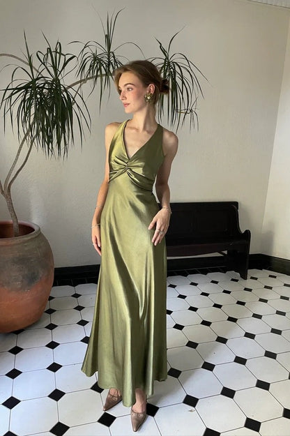Robe de soirée sirène longue jaune dos nu avec col halter