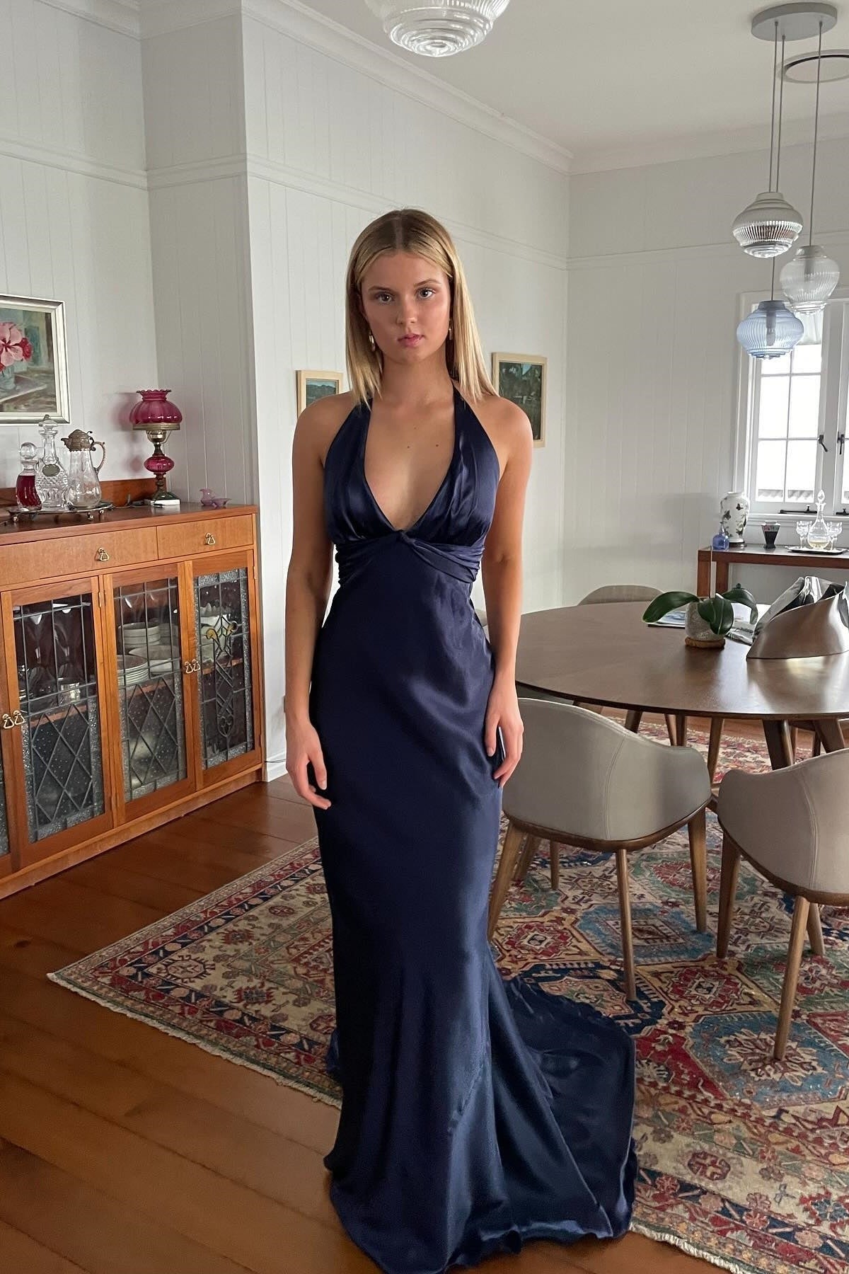 Robe de soirée sirène longue jaune dos nu avec col halter