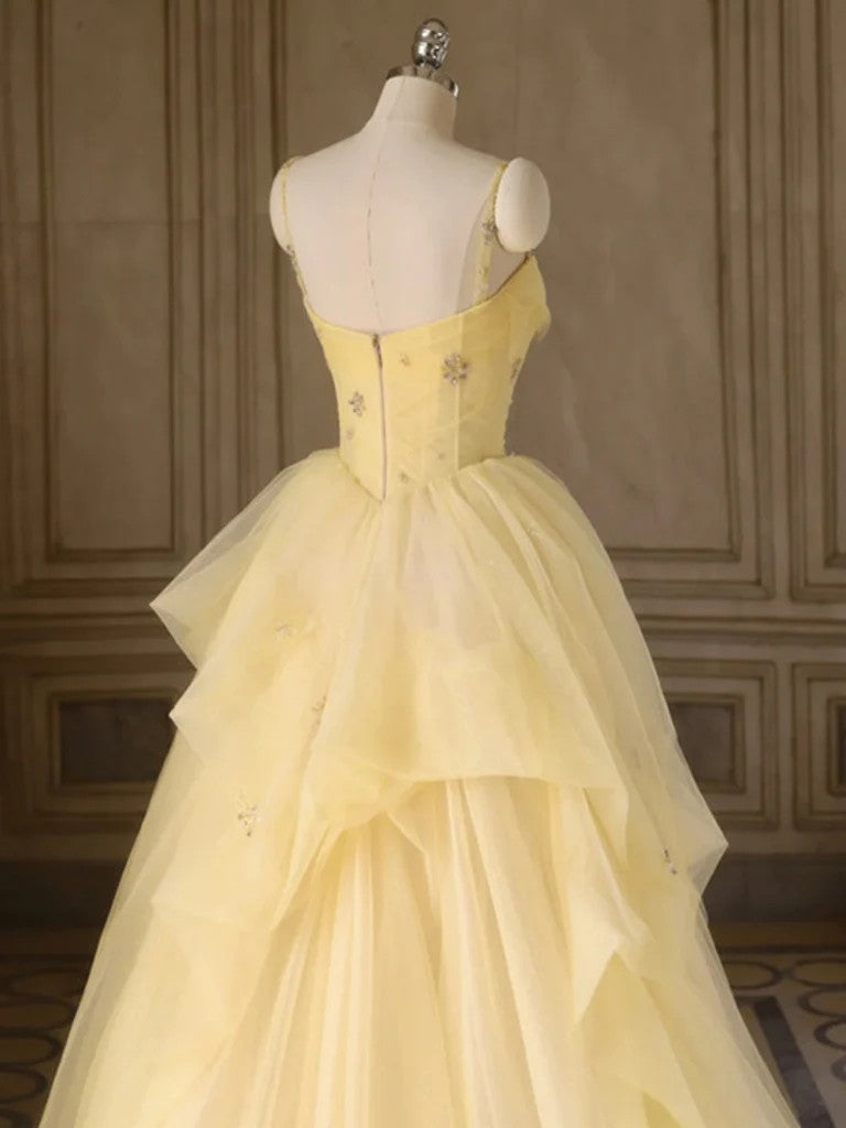 Robes de bal en tulle jaune avec bretelles fines et perles coupe trapèze